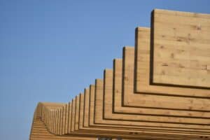 Skyline of construction lumber representing 2024 residential construction forecast