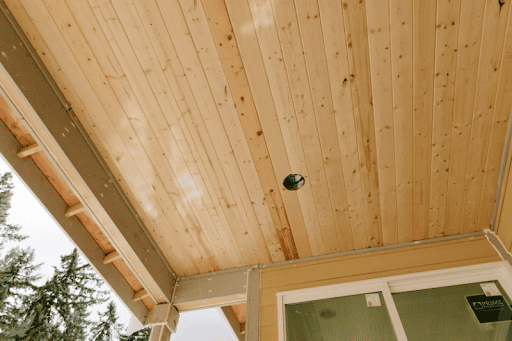 A pine tongue-and-groove ceiling in the external entry to a new home.